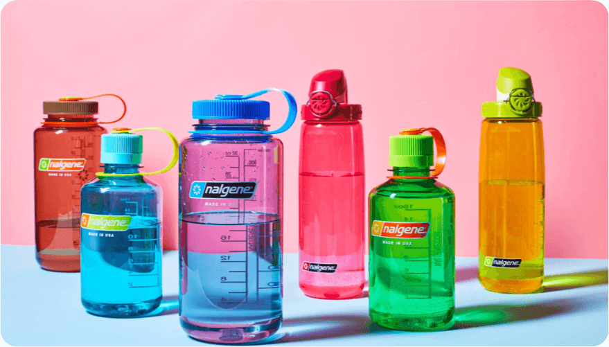 6 different Nalgene water bottles standing next to each other