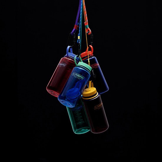 Color Block Collection water bottles hanging with a black background